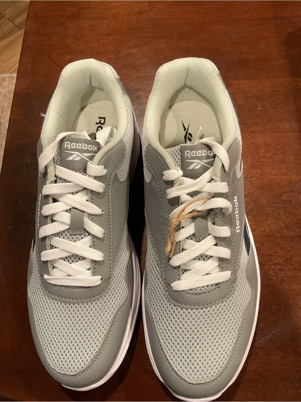 Men's grey running shoes on box size 9